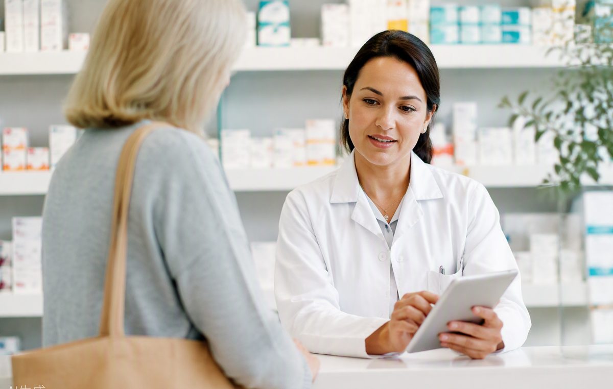 Pharmacist reviewing a customer's pharmacogenomic medication profile at the pharmacy counter